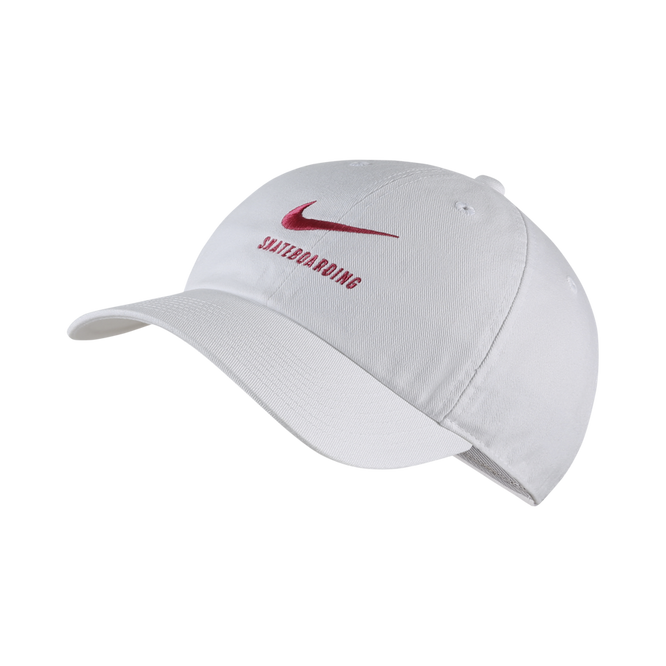 white nike hat with pink swoosh